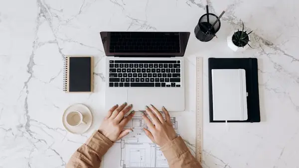 A group of people engaged in remote work at home