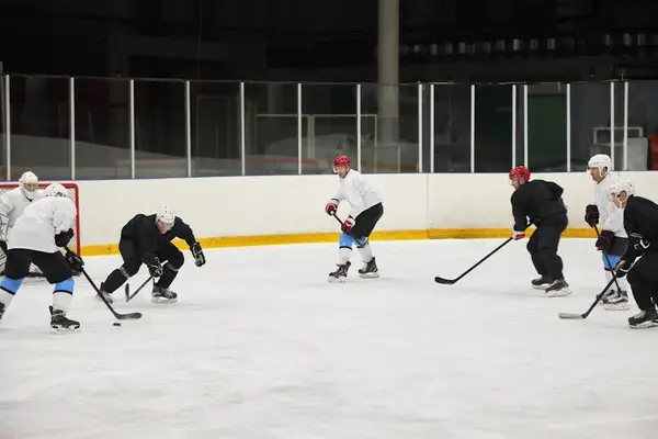 Rocket League players practicing teamwork on the field